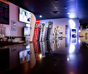 Tap handles for beers on draft at Swagger. 